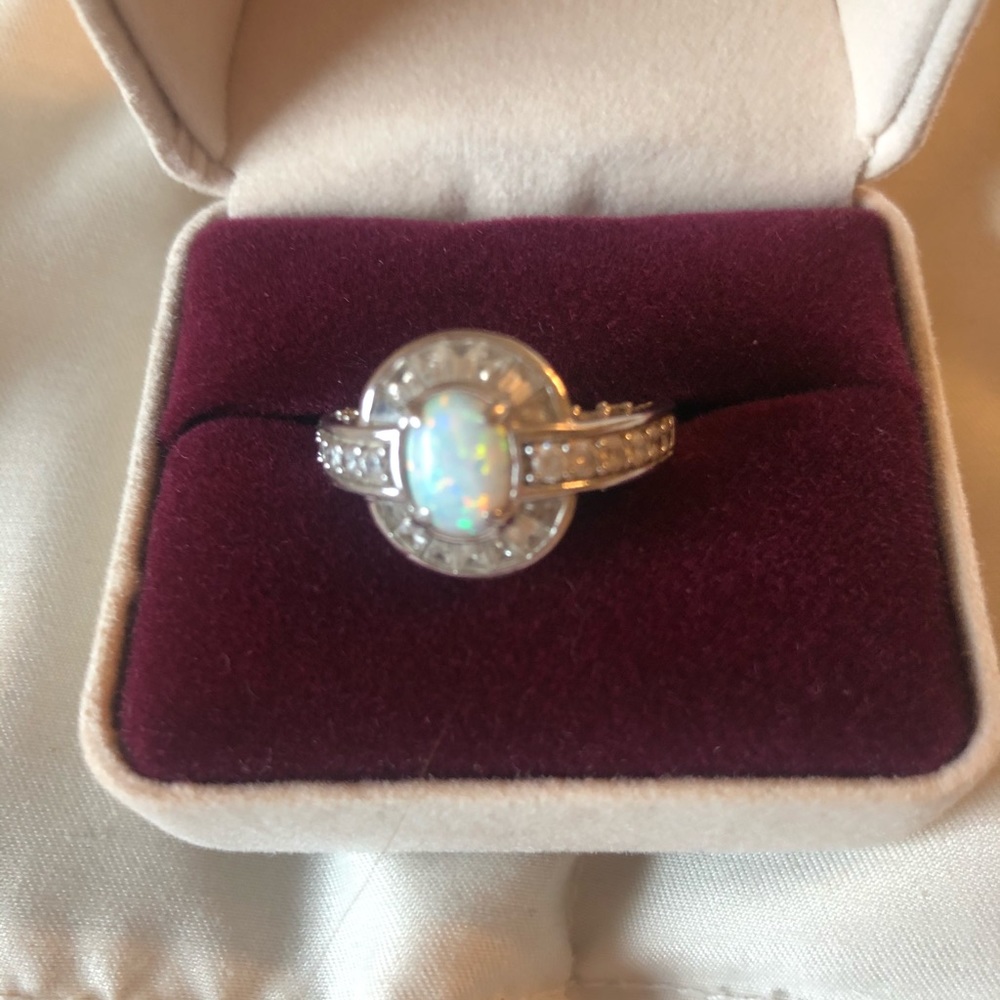 Simulated opal and diamond ring